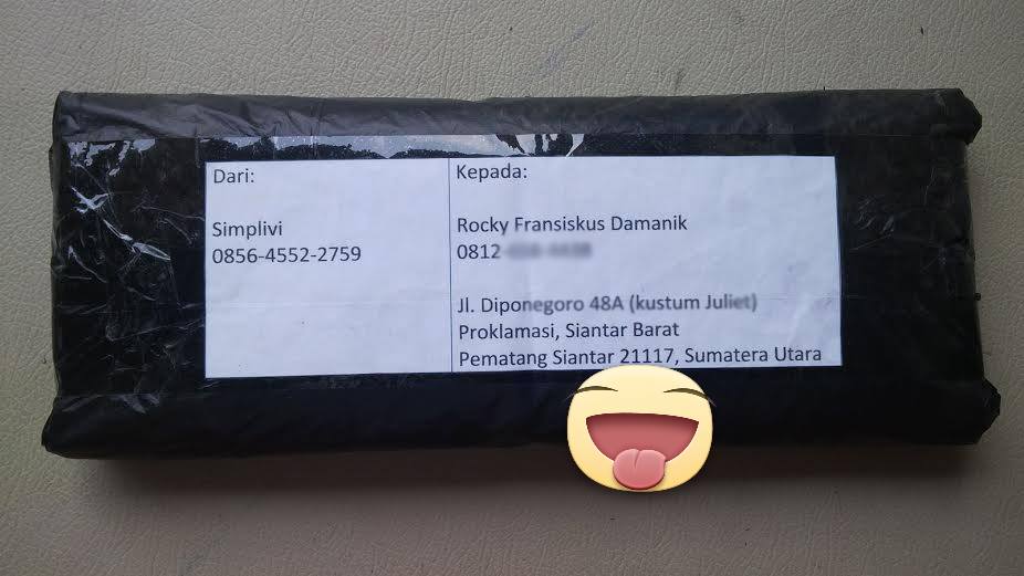 kaos Rocky Damanik